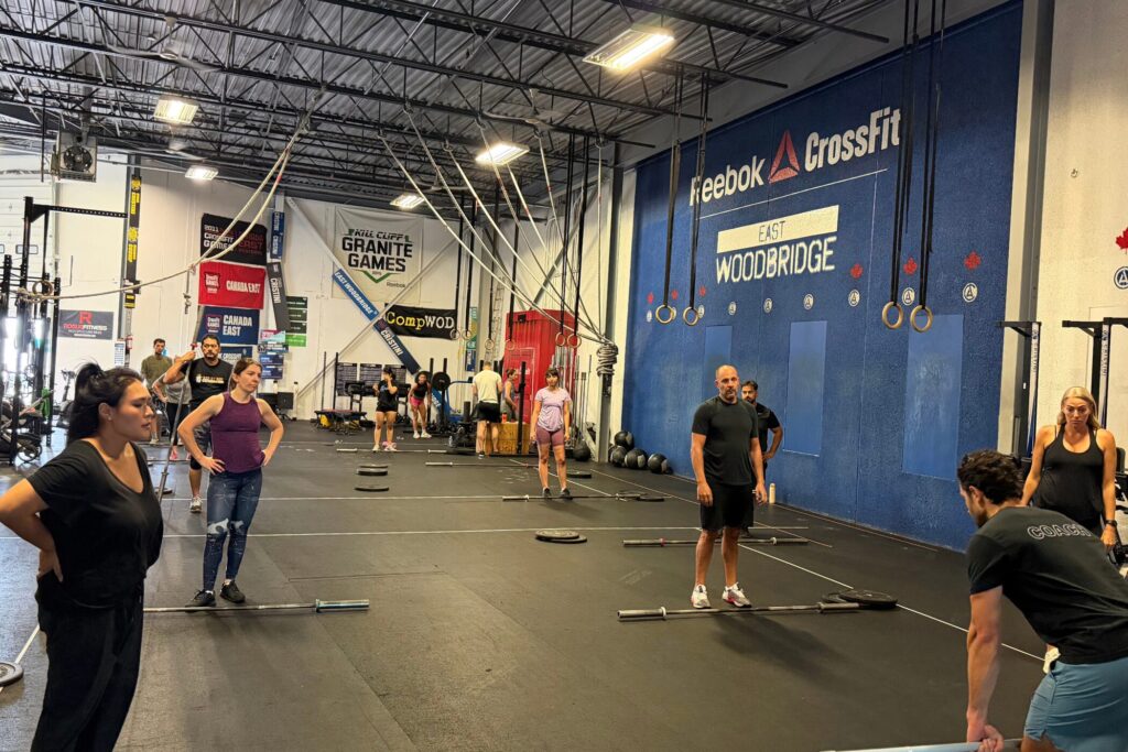 Cristini Athletics coach leading a beginner-friendly CrossFit class at the East Woodbridge gym